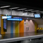 Saint-Germain-en-Laye subway platform showcasing vibrant colors and empty seating.